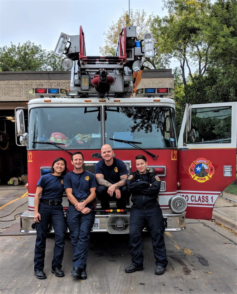 Melody Liao  with fire department crew 