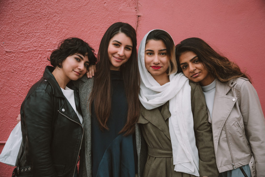 Brown Girls Food Club founders against pink wall