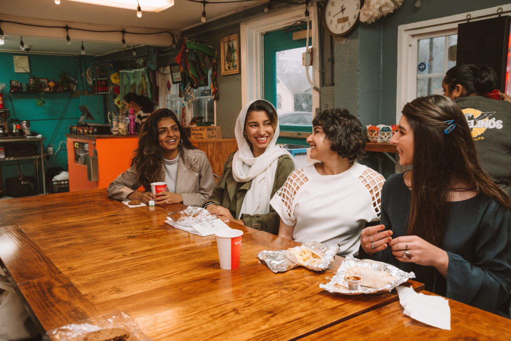 Brown Girls Food Club founders eating by Riley Blanks for Austin Woman magazine