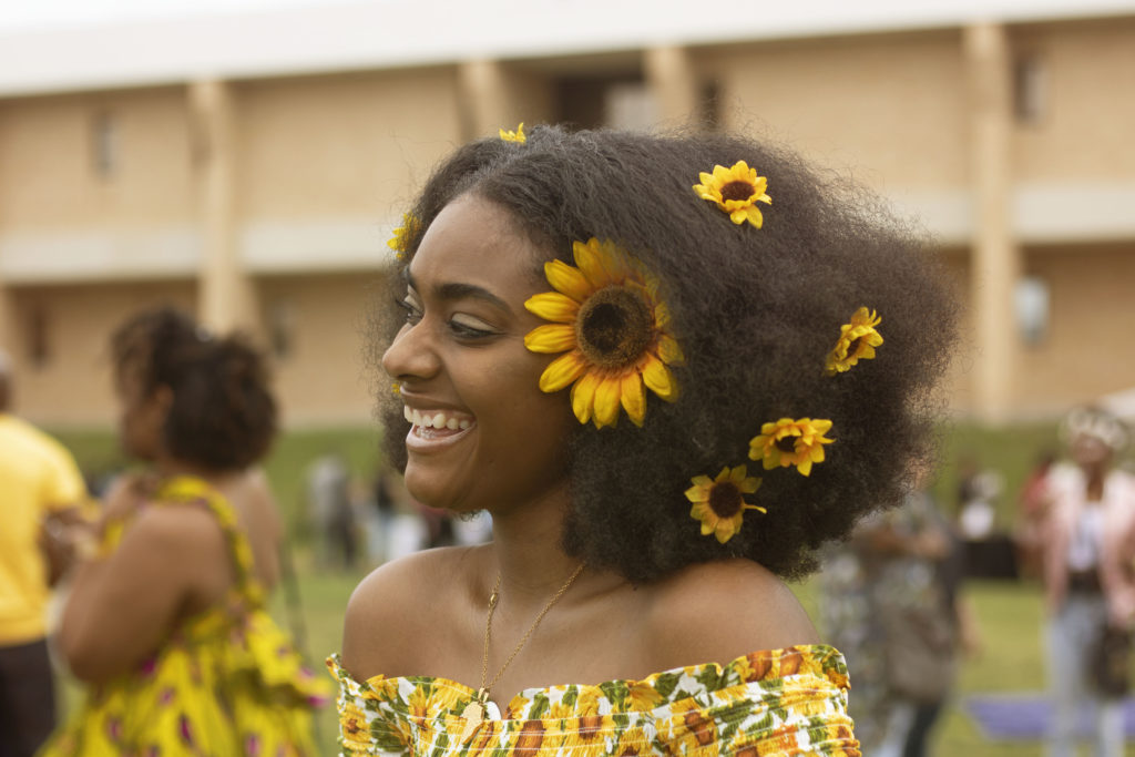 Blossom & Sol Natural Hair Festival - woman with sunflowers in her hair