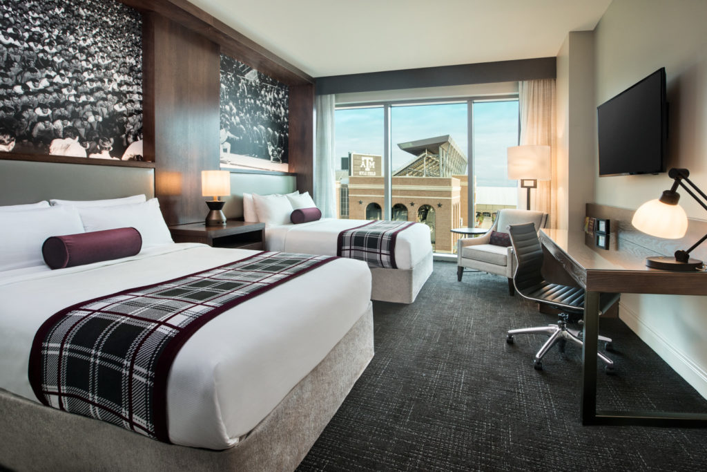 The Texas A&M Hotel aims to create a tranquil restful environment for each overnight guest. Each room is equipped with comfortable beds, a smart TV, a personal fridge, a safe, a Keurig coffee maker, and bath and body products.