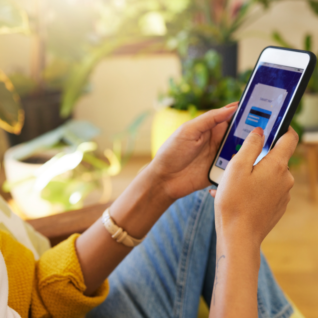 Woman looking at finances on phone