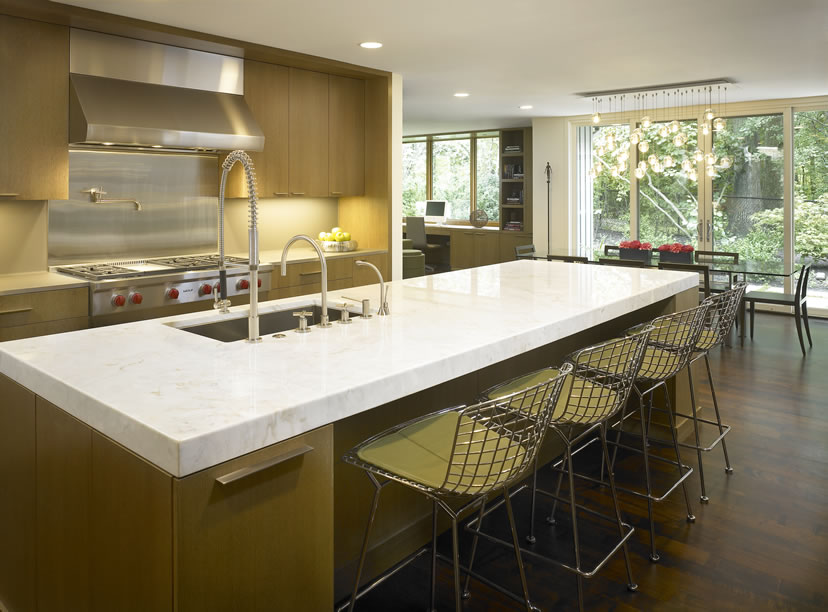 Kitchen with large island designed by Lindsay Maki