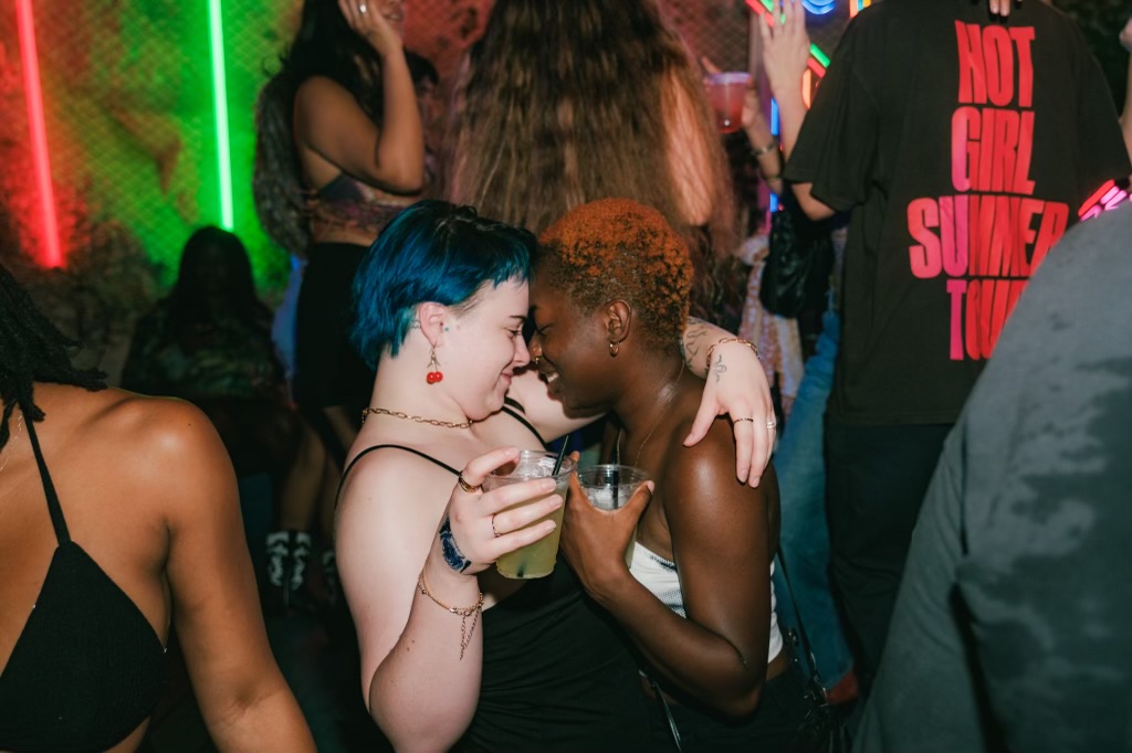 Two women dancing at Cheer Up Charlies