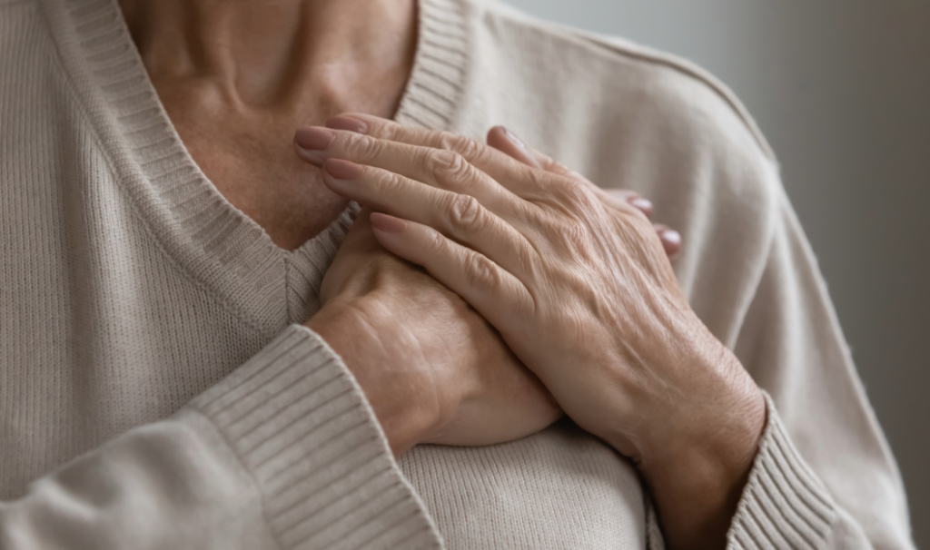 Woman holding heart